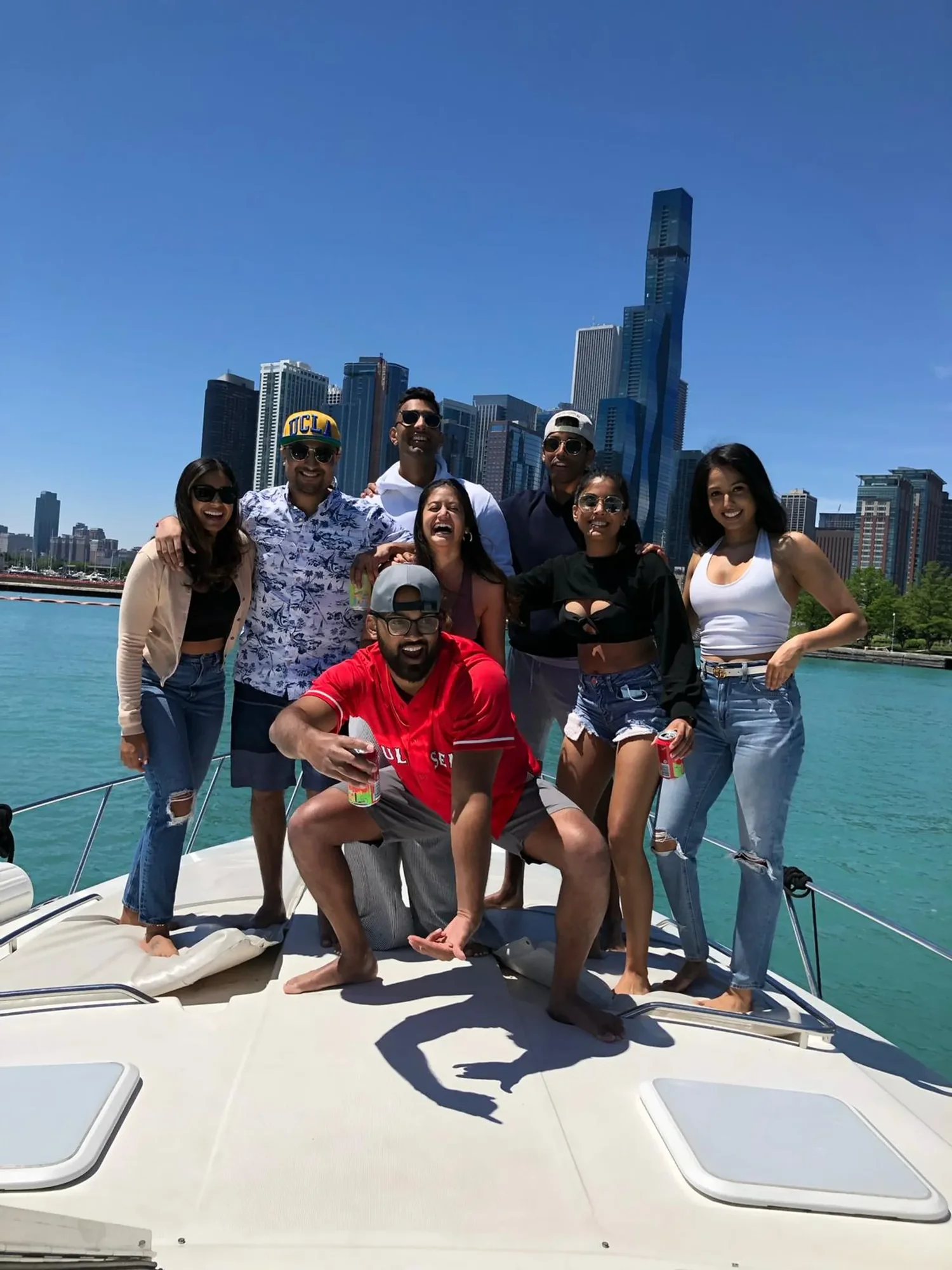 A family and group of friends celebrating aboard the Vertex Yachts private charter in Chicago