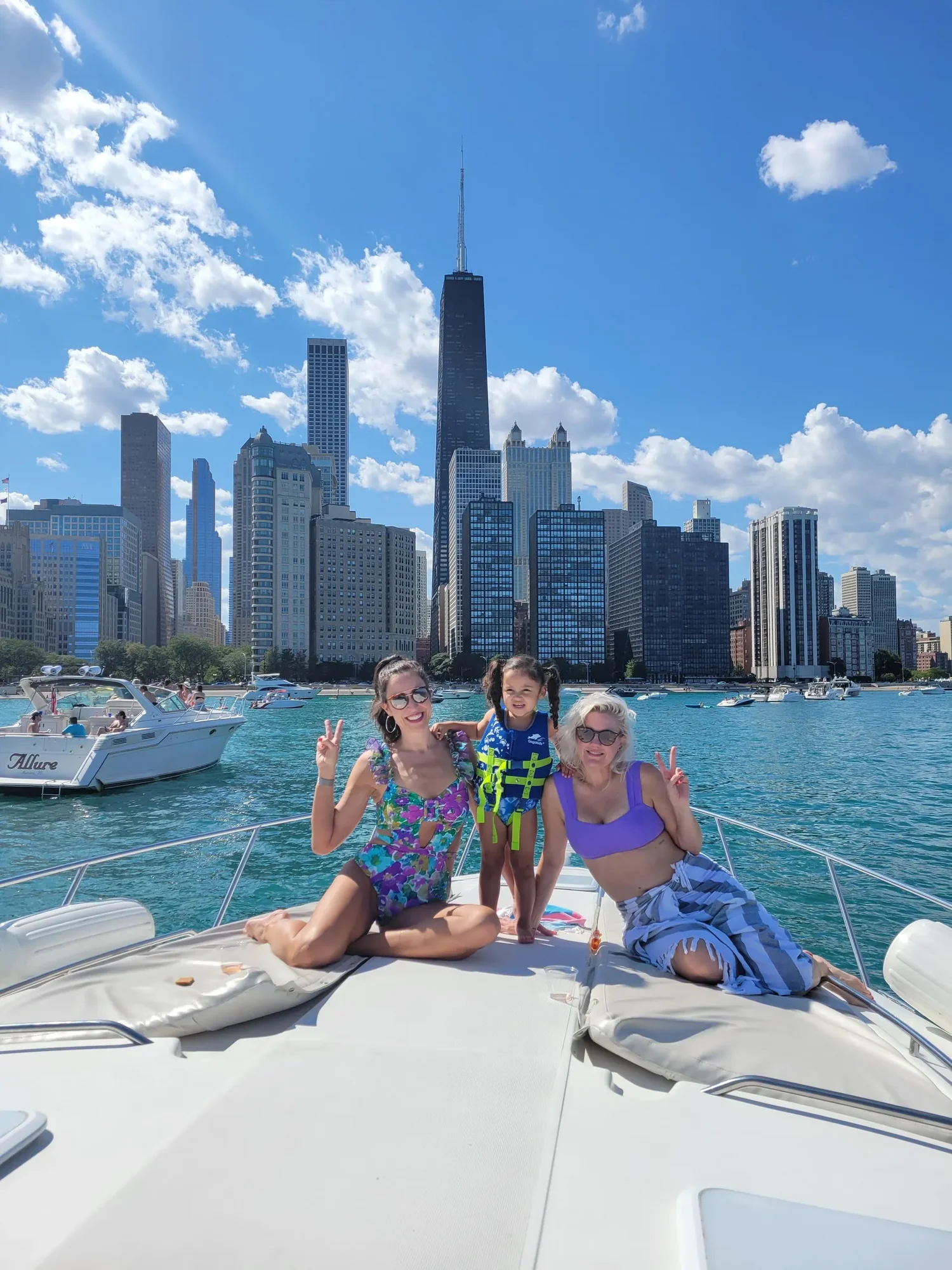 A Vertex Yachts family charter on Lake Michigan with the Chicago skyline in the background